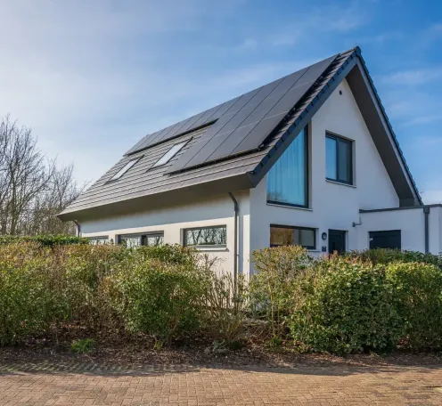 Pelikaanweg 16 – Tien zomerwoningen in twee stijlen img